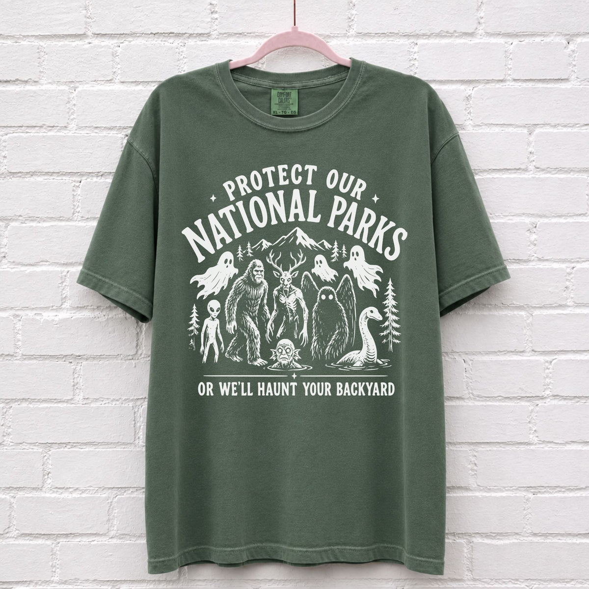 Protect Our National Parks Cryptid Graphic T-Shirt in Moss